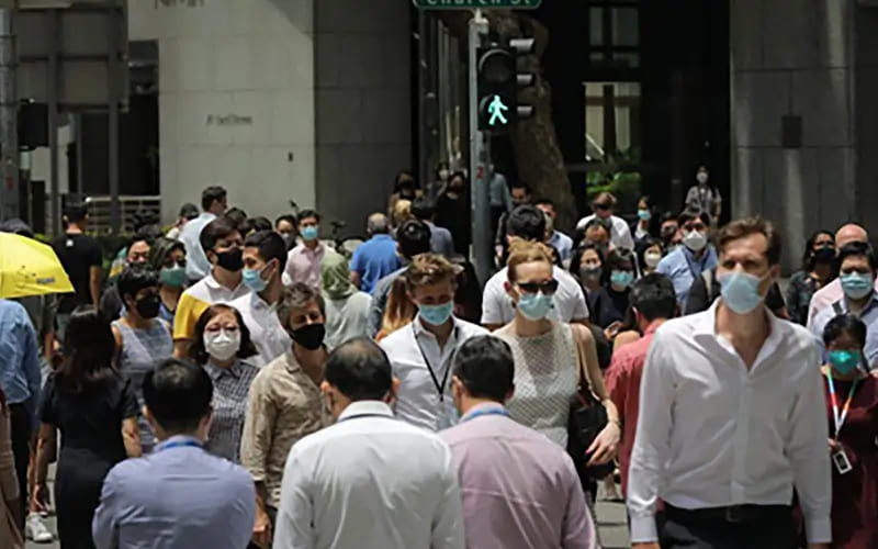 Office workers walking in Singapore’s business district